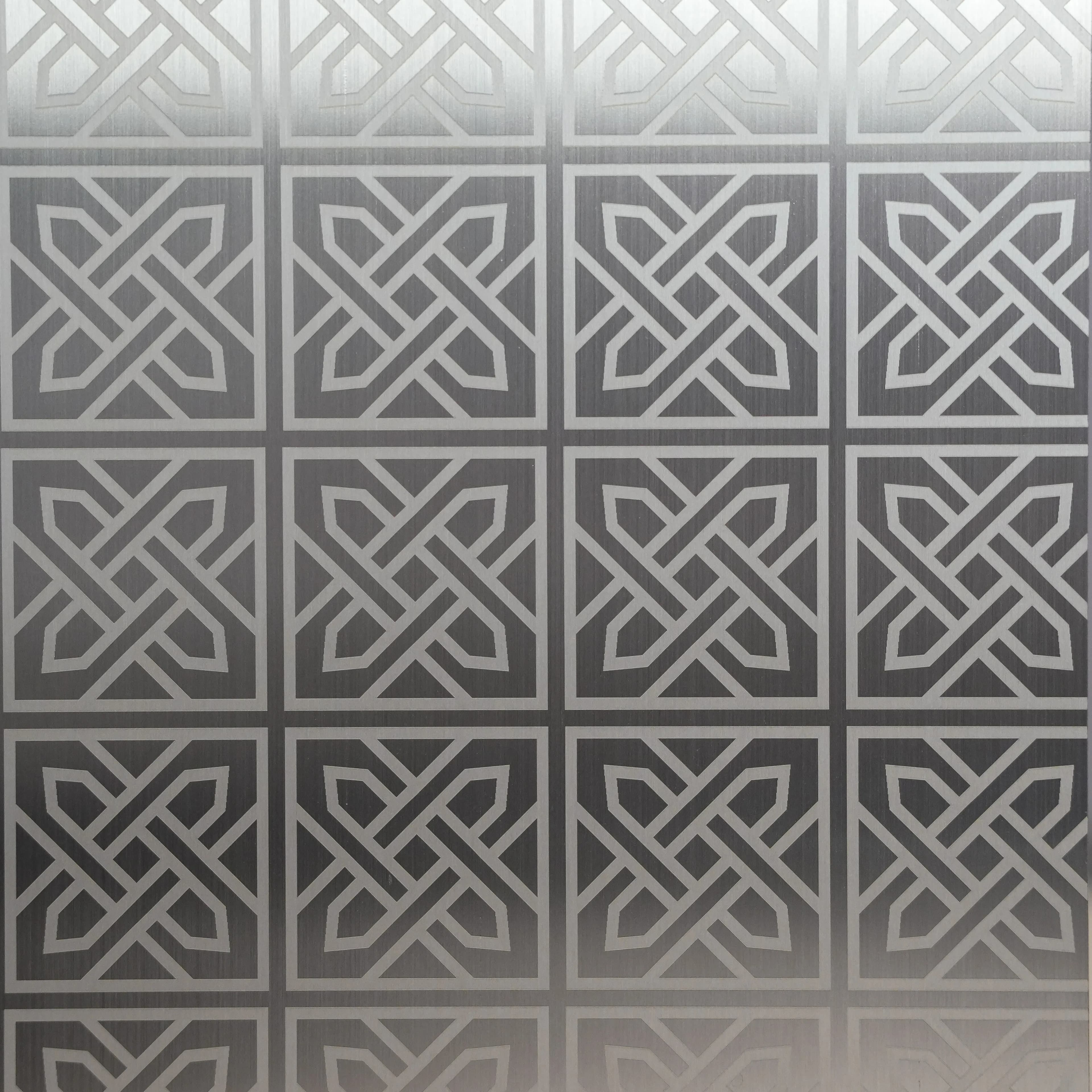 Grid of square panels each holding an interlaced knot motif, etched on a hairline ground