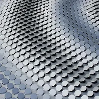 Eccentrico silver round tabs tilted at varying angles forming a wave pattern, close up