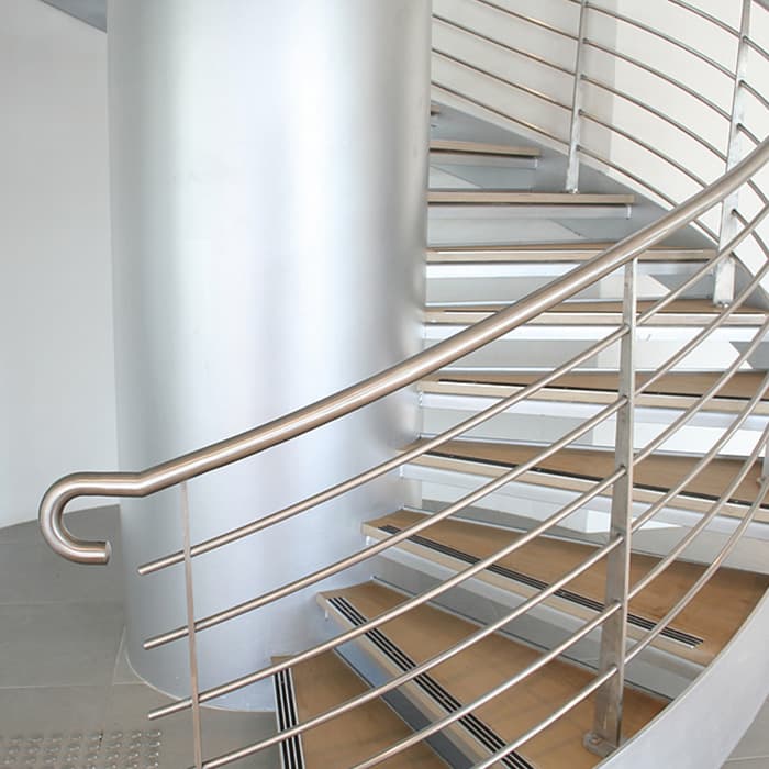 Stainless steel handrail on a spiral staircase