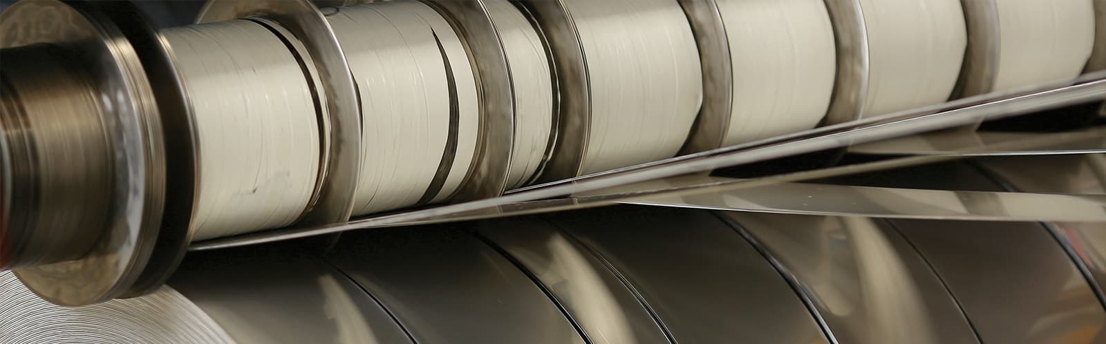 Steel coils stacked in a warehouse