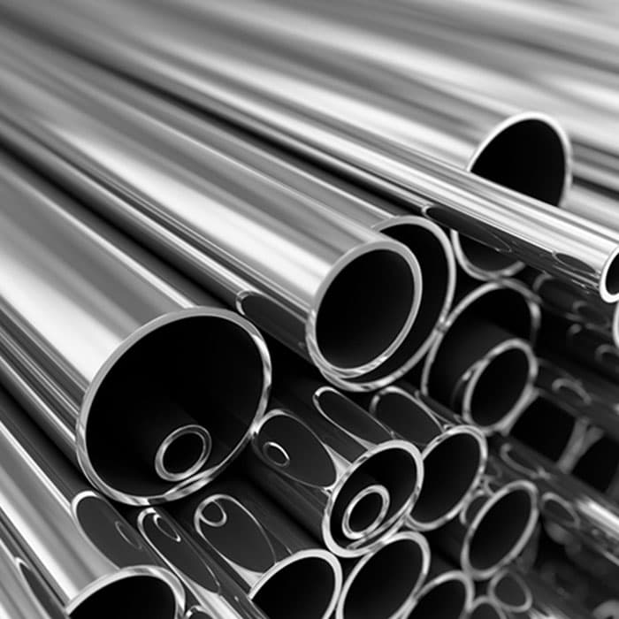 Bundle of polished stainless steel tubes, seen end on